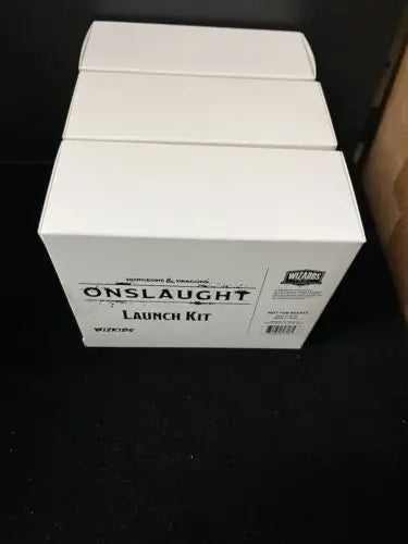 White Dungeons & Dragons Onslaught Launch Kit boxes for the Onslaught Launch collection