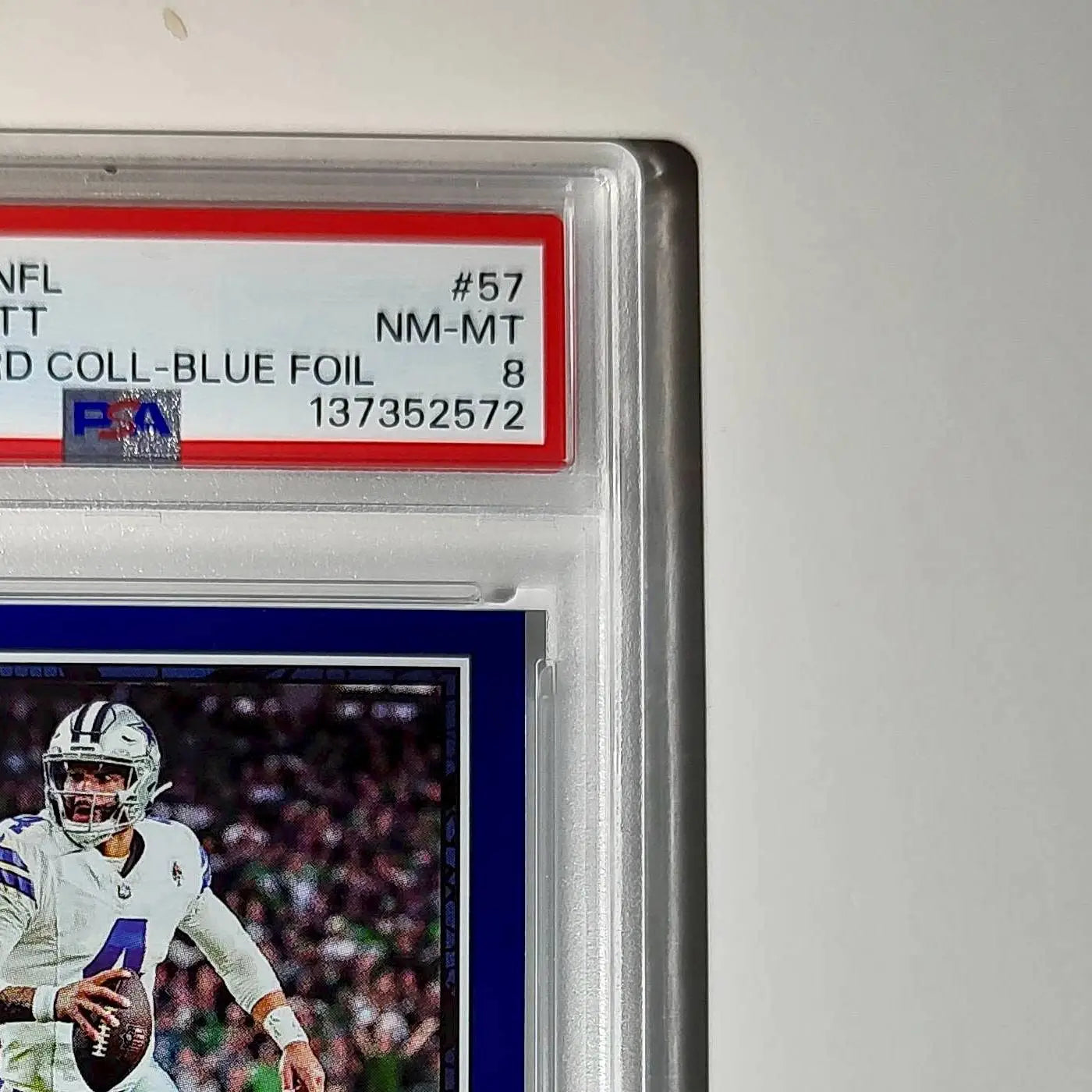 Dak Prescott 2024 Panini Sticker Collection 167/349 #57 Blue Foil PSA 8 NM-MT