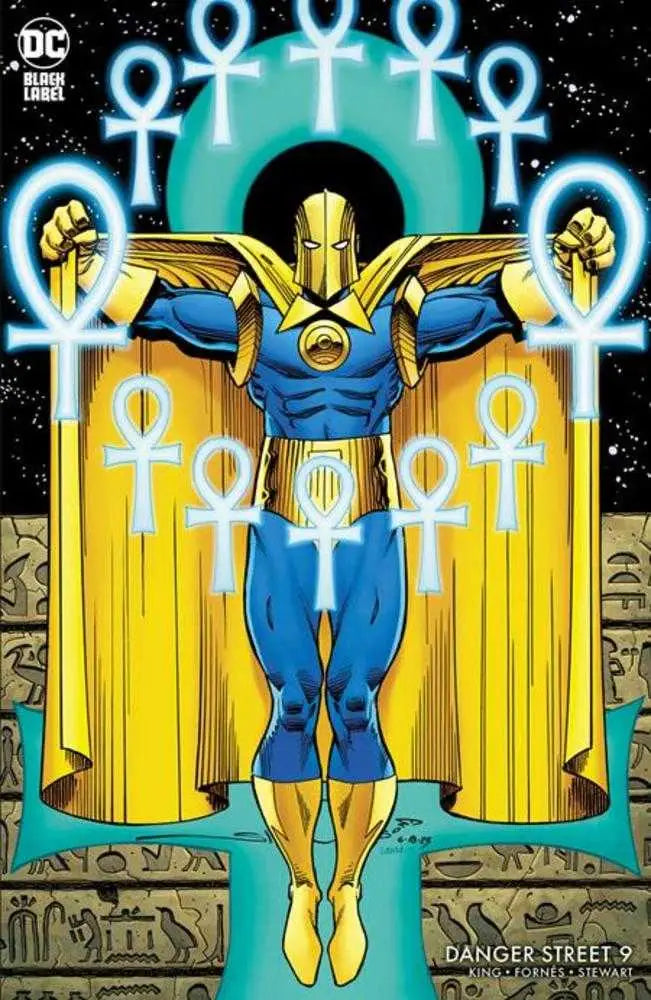 A blue and gold armored figure stands against glowing ankh symbols on a comic cover
