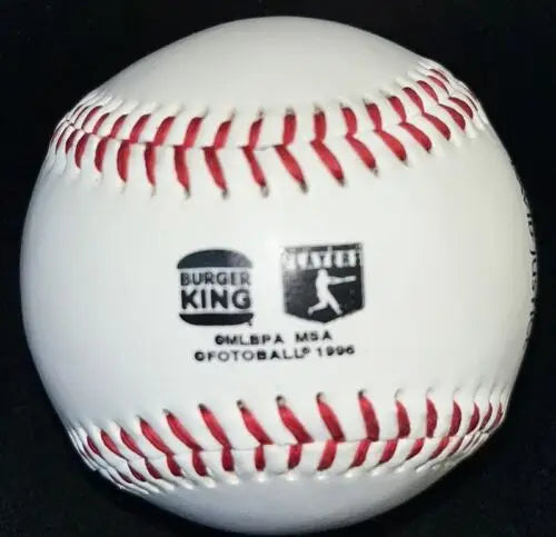 White baseball with red stitching for Dave Justice Fotoball, 1996 Burger King Logo Ball