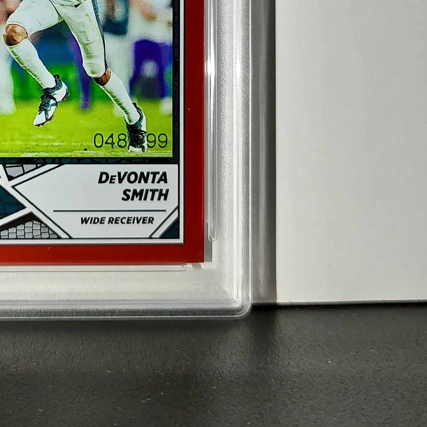 DeVonta Smith 2024 Panini Sticker Collection 048/299 #44 Red Foil PSA 9 Mint