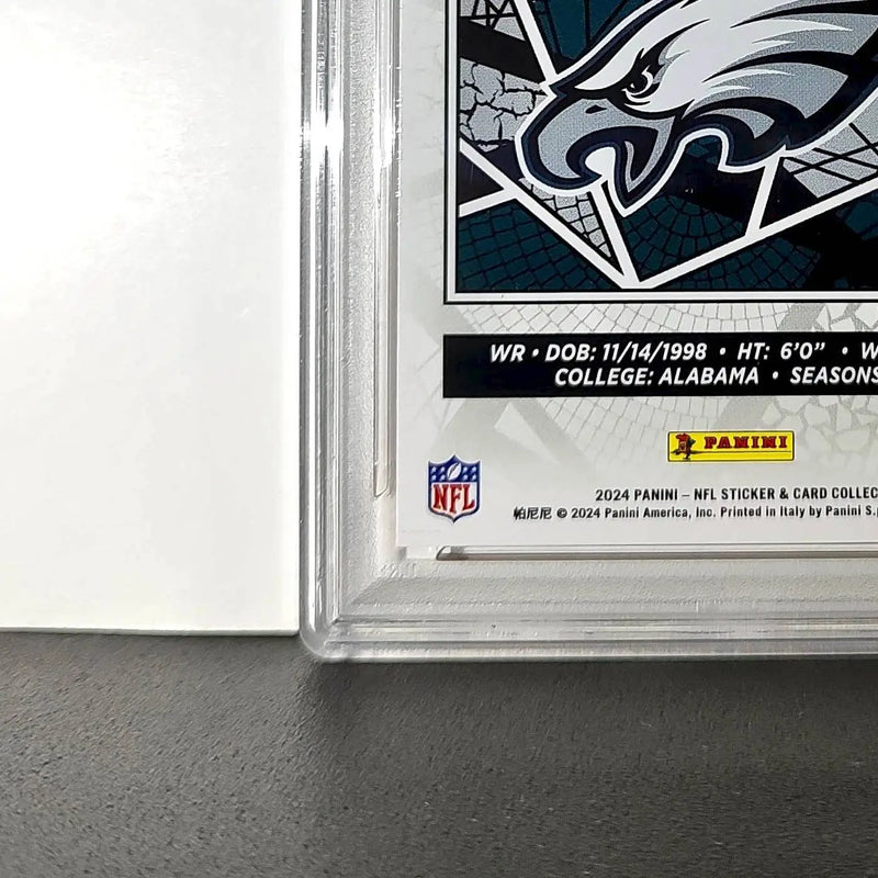 DeVonta Smith 2024 Panini Sticker Collection 048/299 #44 Red Foil PSA 9 Mint