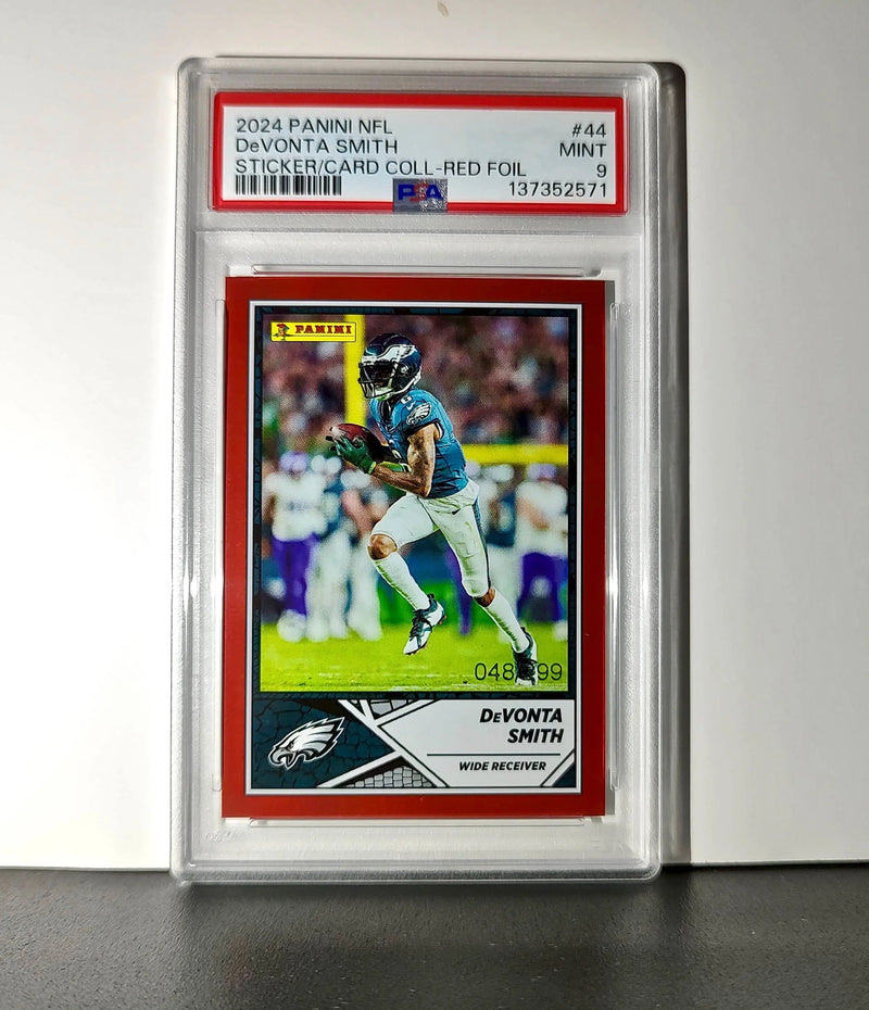 DeVonta Smith 2024 Panini Sticker Collection 048/299 #44 Red Foil PSA 9 Mint