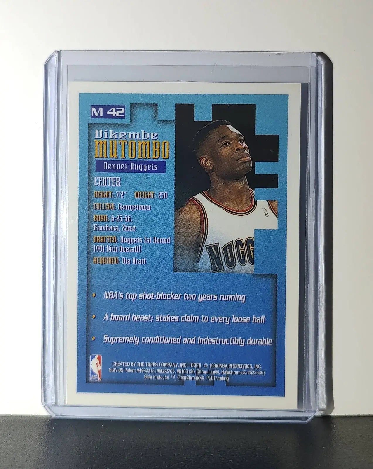 Dikembe Mutombo 1995-96 Topps Finest NBA #M42 Mysterly Nuggets
