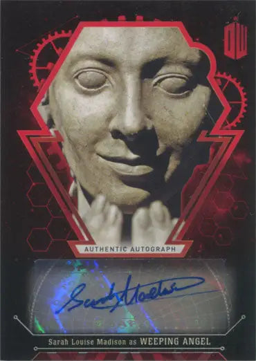 Stone sculpture face with red geometric design in Sarah Louise Madison Autograph Card