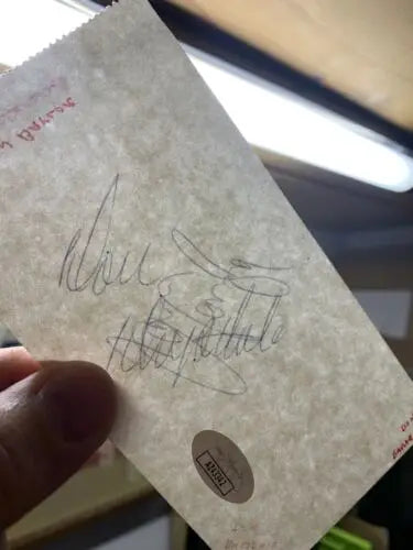 Autographed paper bag featuring Don Drysdale Dodgers and Don Baylor Yankees signatures