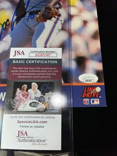 JSA authentication sticker on Dwight Doc Gooden NY Mets action photo for baseball cards