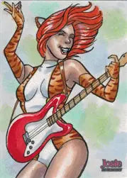 Animated Arley Tucker character with red hair playing guitar from trading cards series