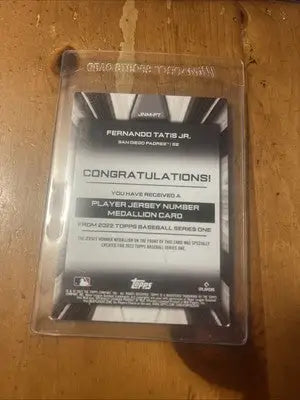 Fernando Tatis Jr 2022 Topps Jersey Number Medallion Relic Padres card featuring jersey number