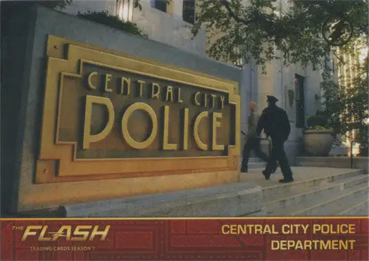 Gold-colored Central City Police sign depicting logo parallel chase for Season 1