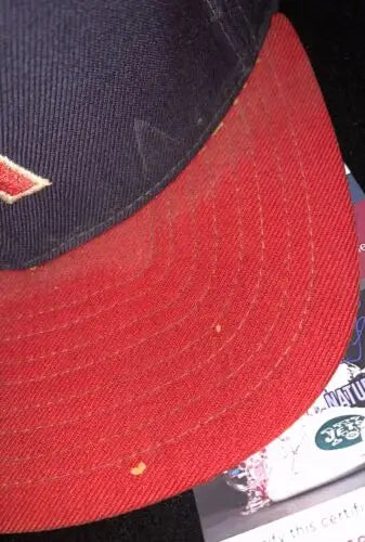 Red and navy baseball cap from Freddie Patek, a collectible California Angels item