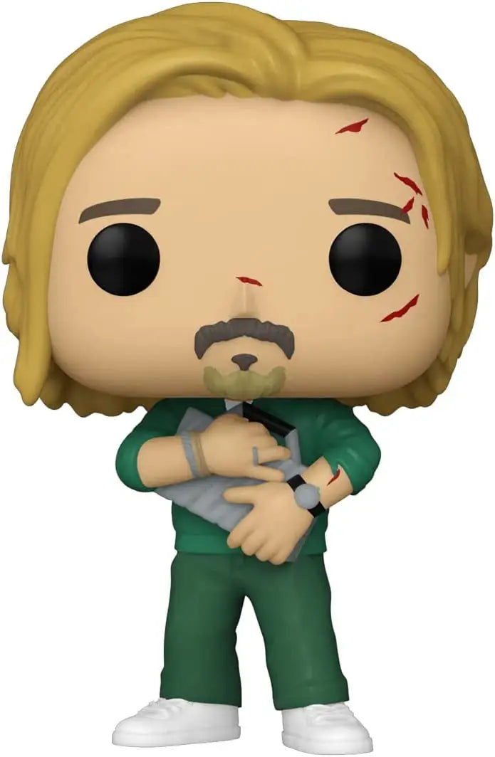 Funko Pop figurine of a blonde man in green scrubs with baby from Bullet Train