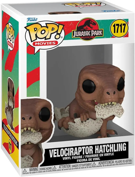 Funko Pop Velociraptor Hatchling from Jurassic Park emerging from egg shell