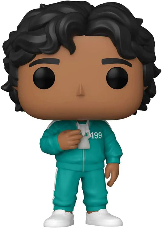 Funko Pop figurine of Squid Game Player 199 Ali in teal scrubs with a syringe
