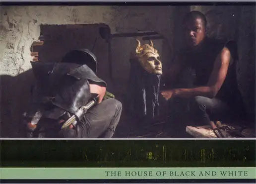 Photograph of people in dim light with a figure in a golden crown on a Gold Parallel trading card