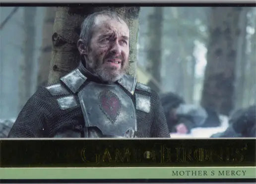 Middle-aged man in beard wearing medieval armor in forest for Game of Thrones gold parallel trading card