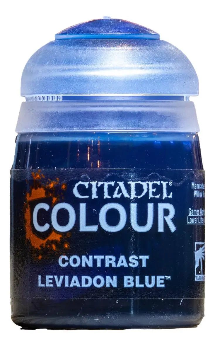Clear plastic pot of Citadel Contrast Leviathan Blue paint for miniature models