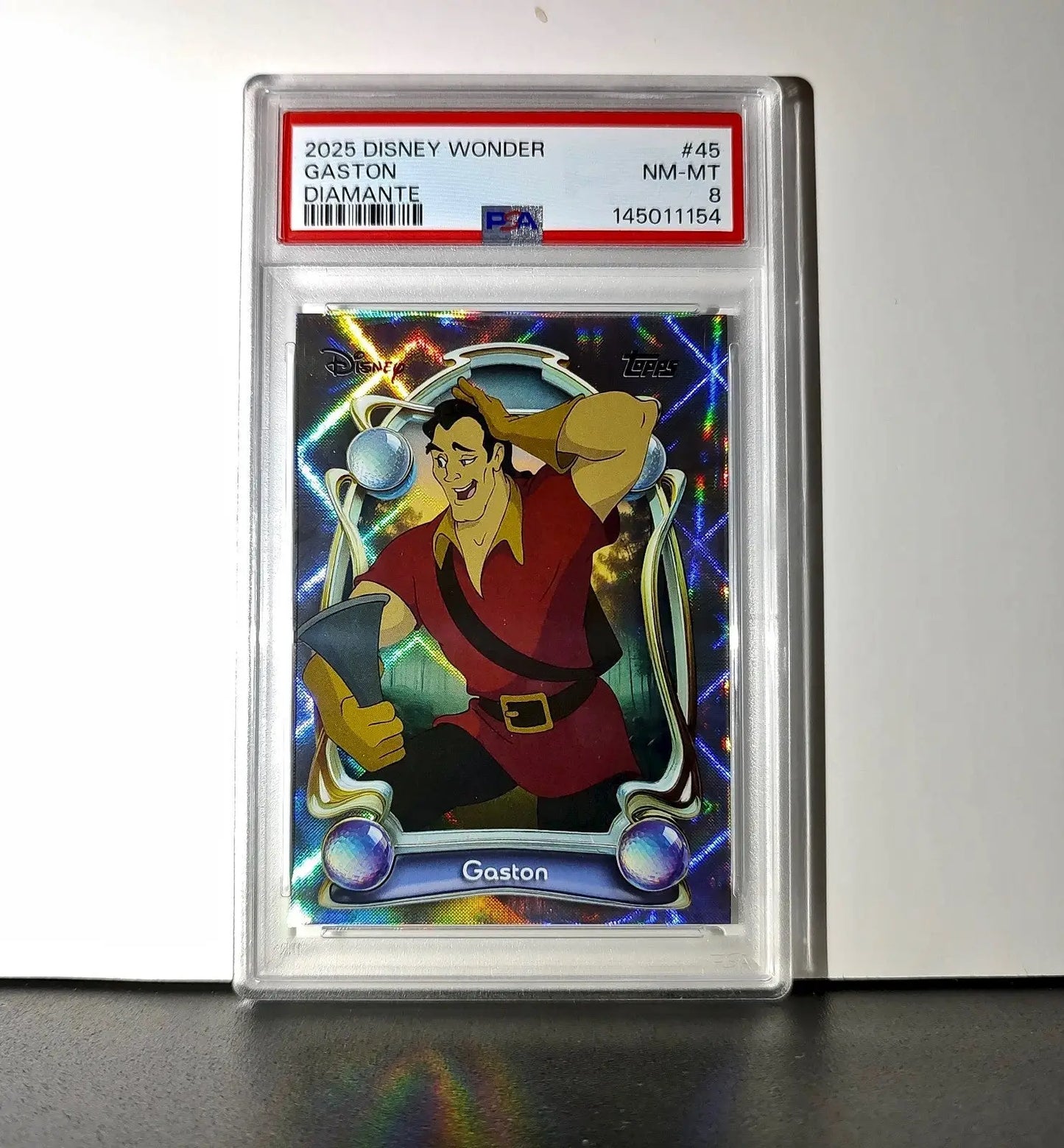 Gaston 2025 Topps Disney #45 Winter Variant Card Beauty and the Beast PSA 8 - Non-Sports Card Single