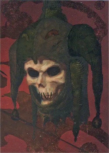 Grinning skull in green jester hat from Metallic Storm Chase Card by Gerald Brom
