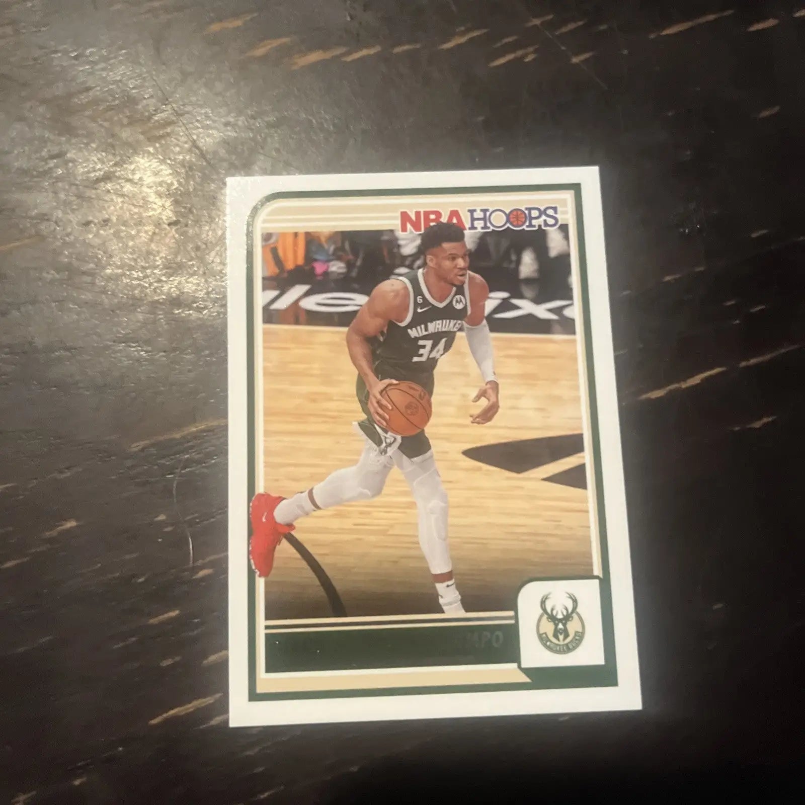 Giannis Antetokounmpo NBA Hoops trading card from the 2024 Bucks basketball set