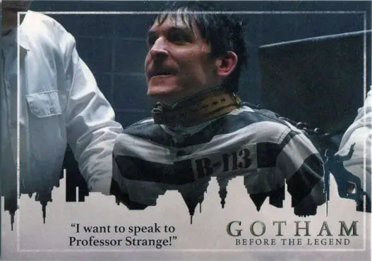 A distressed man in a prison uniform on Gotham Season 2 Penguin Deco Foil stamp card
