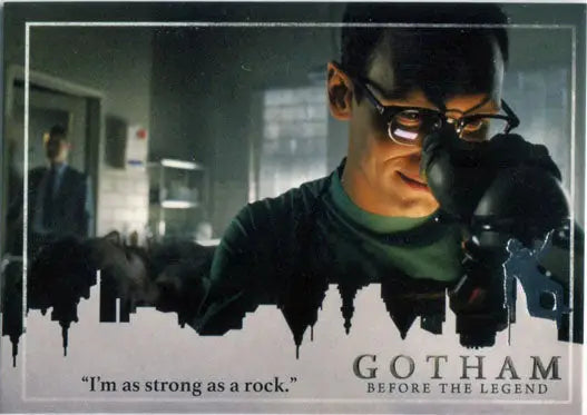 Man in glasses and green shirt examining Gotham Season 2 Penguin Deco Foil Stamp Variant