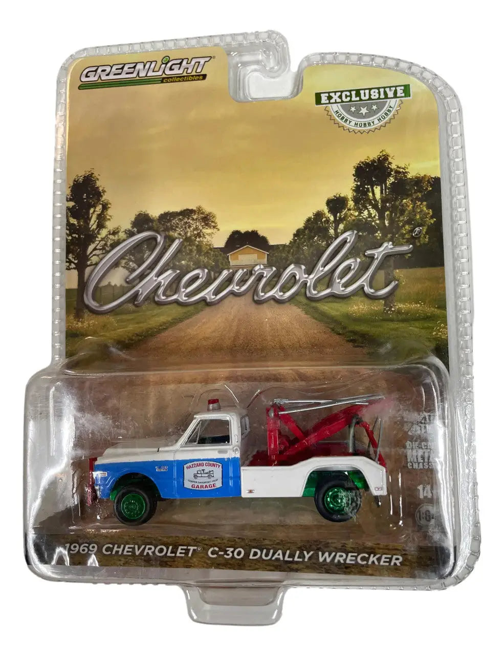 Die-cast model of 1954 Chevrolet C-50 Dually Wrecker in Greenlight packaging