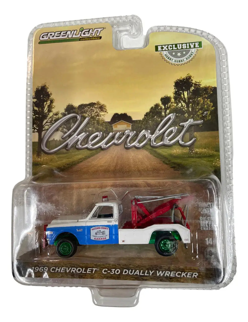 Die-cast model of 1954 Chevrolet C-50 Dually Wrecker in Greenlight packaging
