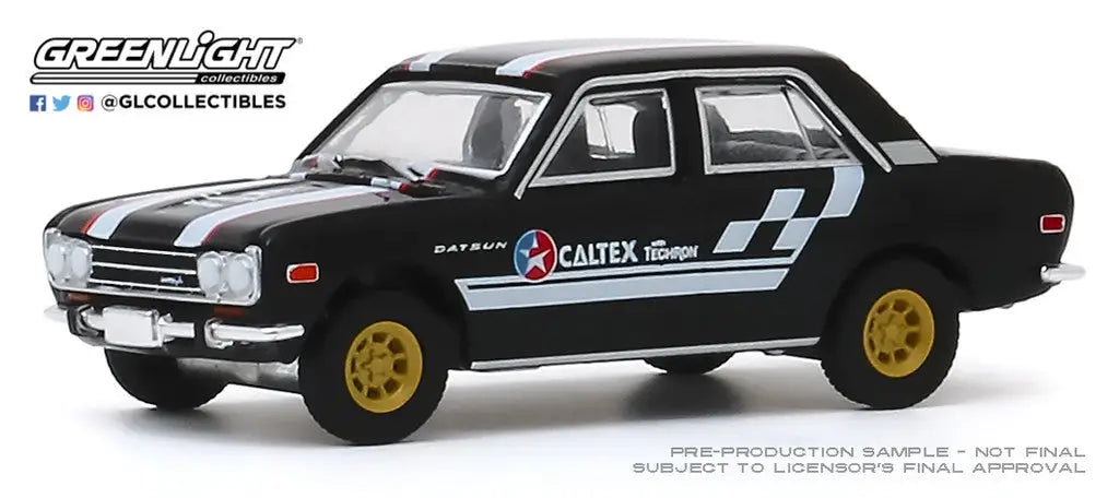 Black vintage racing car with gold wheels and Caltex decals from Hobby Exclusive collection