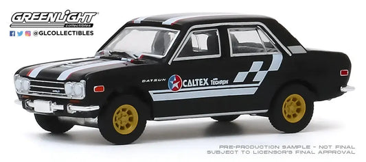 Black vintage racing car with gold wheels and Caltex decals from Hobby Exclusive collection