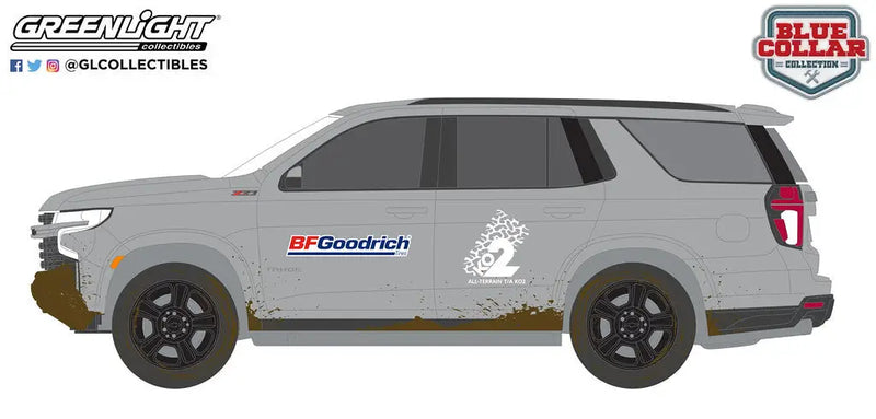 Gray SUV with racing-style decals and black wheels from Greenlight Blue Collar Series 12