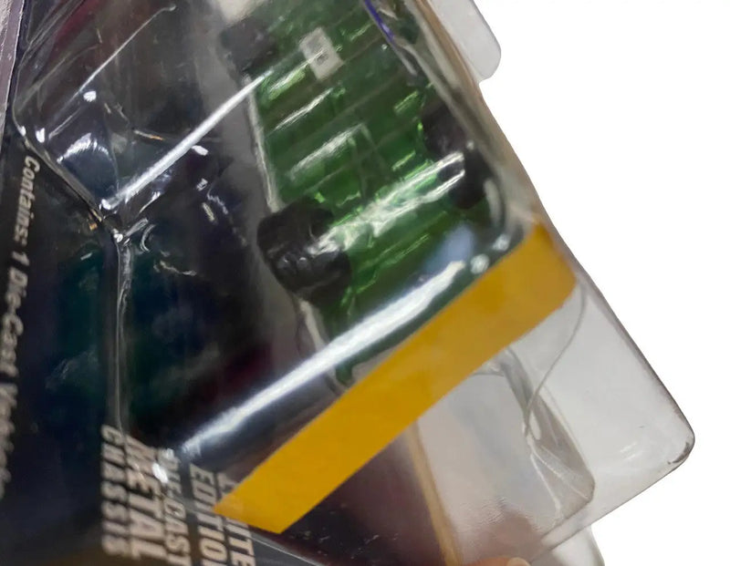Partially visible container with colorful liquids beside Ford Crown Victoria Alabama State Police