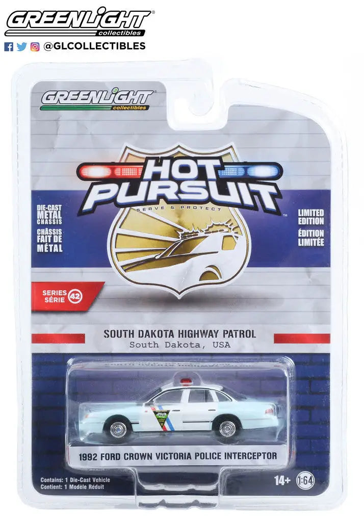 Packaged die-cast model of a 1992 Ford Crown Victoria from Hot Pursuit Series