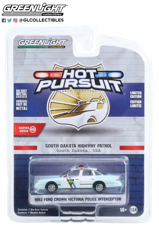 Packaged die-cast model of a 1992 Ford Crown Victoria from Hot Pursuit Series