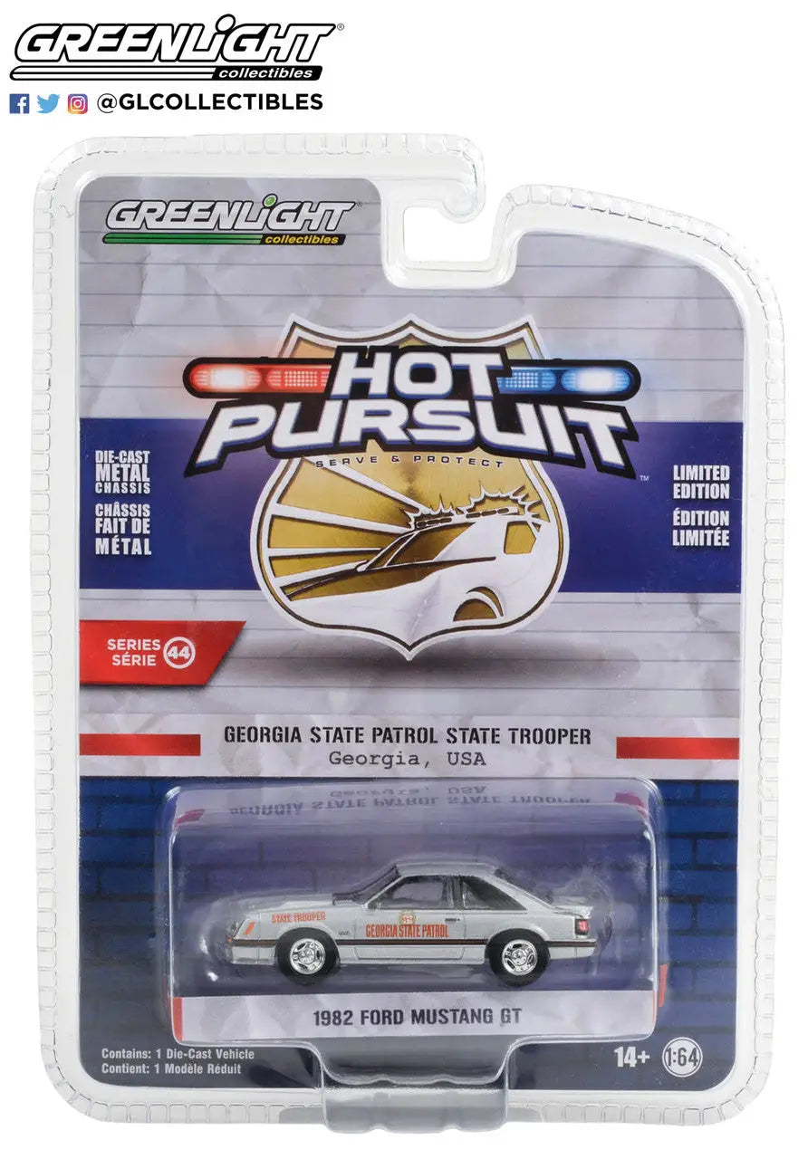 Die-cast model of a 1982 Ford Mustang GT police car in Hot Pursuit Series packaging