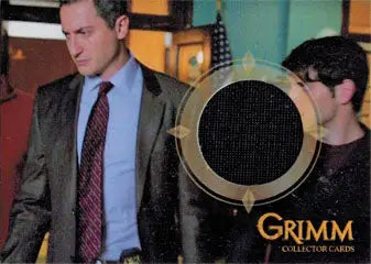 Circular porthole with brass frame in Grimm 2013 trading card featuring Sasha Roiz as Captain Renard