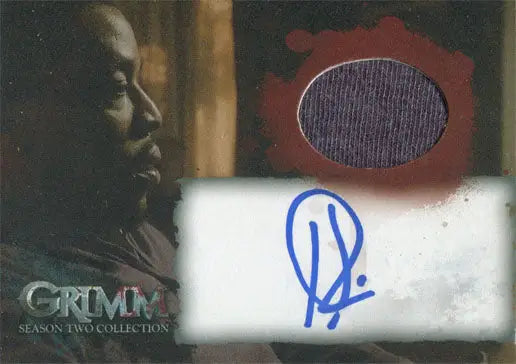 Autographed trading card featuring Hank from Grimm with fabric swatch and portrait
