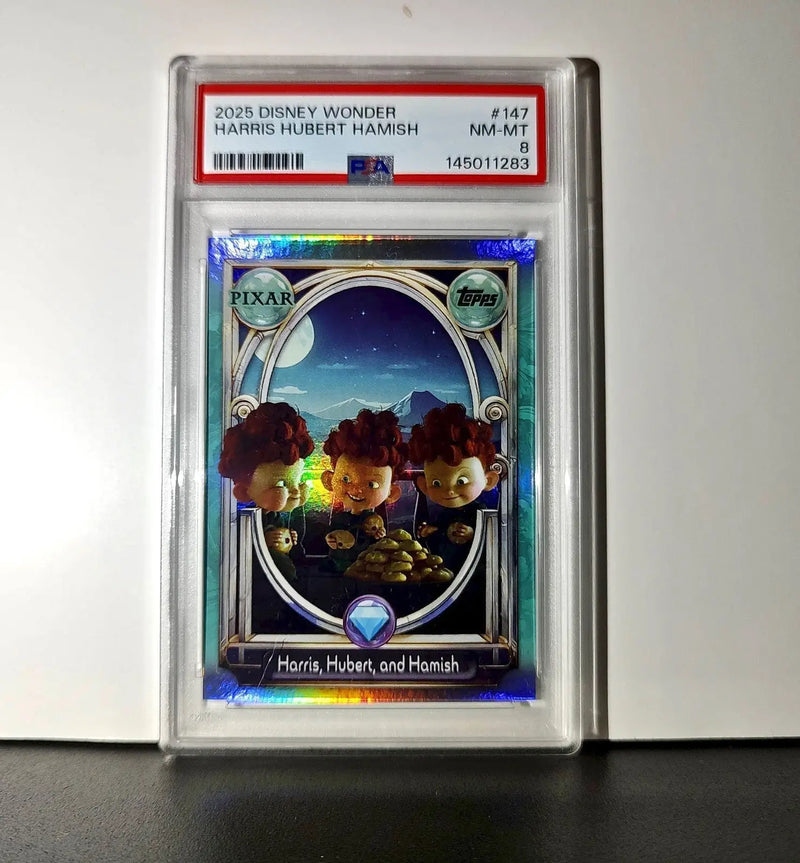 Harris Hubert and Hamish 2025 Topps Disney #147 Diamond Card Brave PSA 8 - Non-Sports Card Single