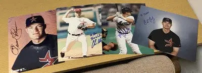 Signed Houston Astros baseball player photographs featuring Chris Holt and Russ Johnson