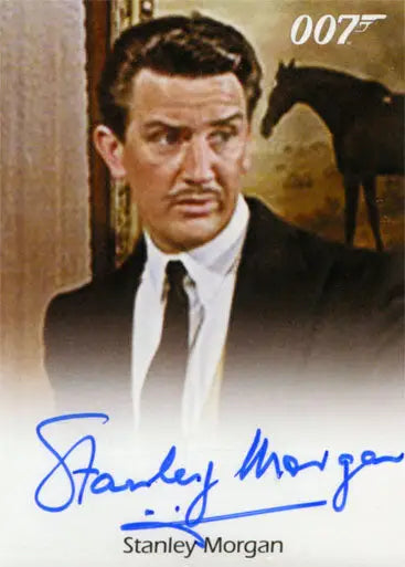 Autographed trading card of Stanley Morgan as Concierge with 007 logo displayed
