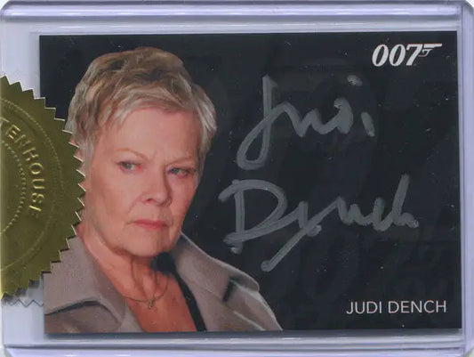 Autographed James Bond signature autograph card of Judi Dench with short blonde hair