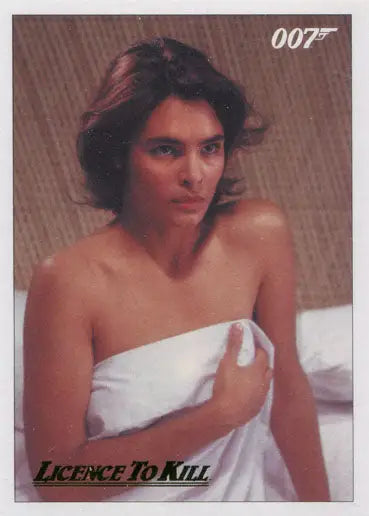 Woman with dark hair in towel posing for James Bond 007 Gold Parallel Chase Card