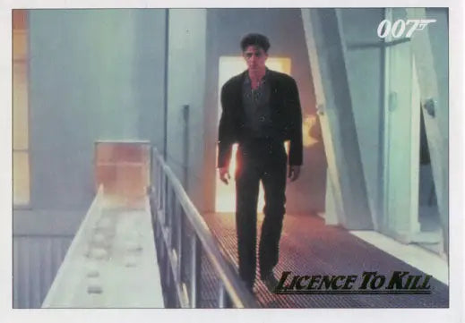 Man in a dark suit walking on a narrow walkway on a Gold Parallel Chase Card