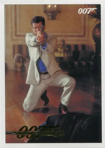 Man in a white suit aiming a gun from James Bond 007 trading cards gold parallel