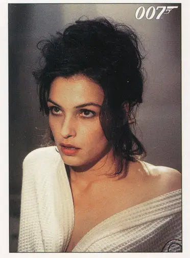 Portrait of a woman in white off-shoulder top featured on James Bond promo card