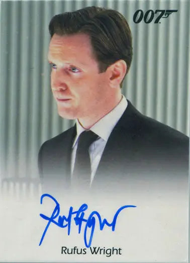 Autographed trading card of Rufus Wright in dark suit for James Bond Archives 2017