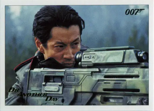 Man aiming a futuristic weapon in James Bond Archives 2017 Gold Foil trading card