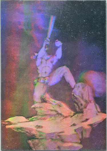 Muscular figure wielding a sword in dynamic pose on Jeffrey Jones Hologram Chase Card