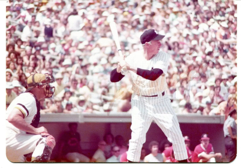 Vintage baseball game scene featuring New York Yankees for baseball cards collectors