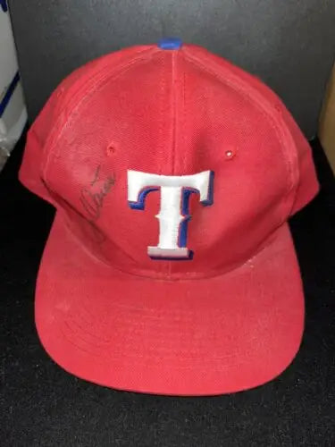 Red baseball hat cap with white T logo from Johnny Oates Texas Rangers HOF